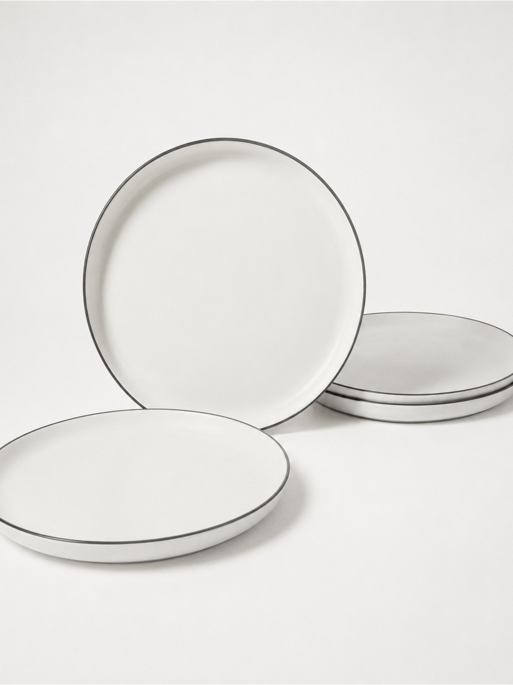 Sur La Table Ceramic Dinner Plates with Subtle Black Rim - Set of 4